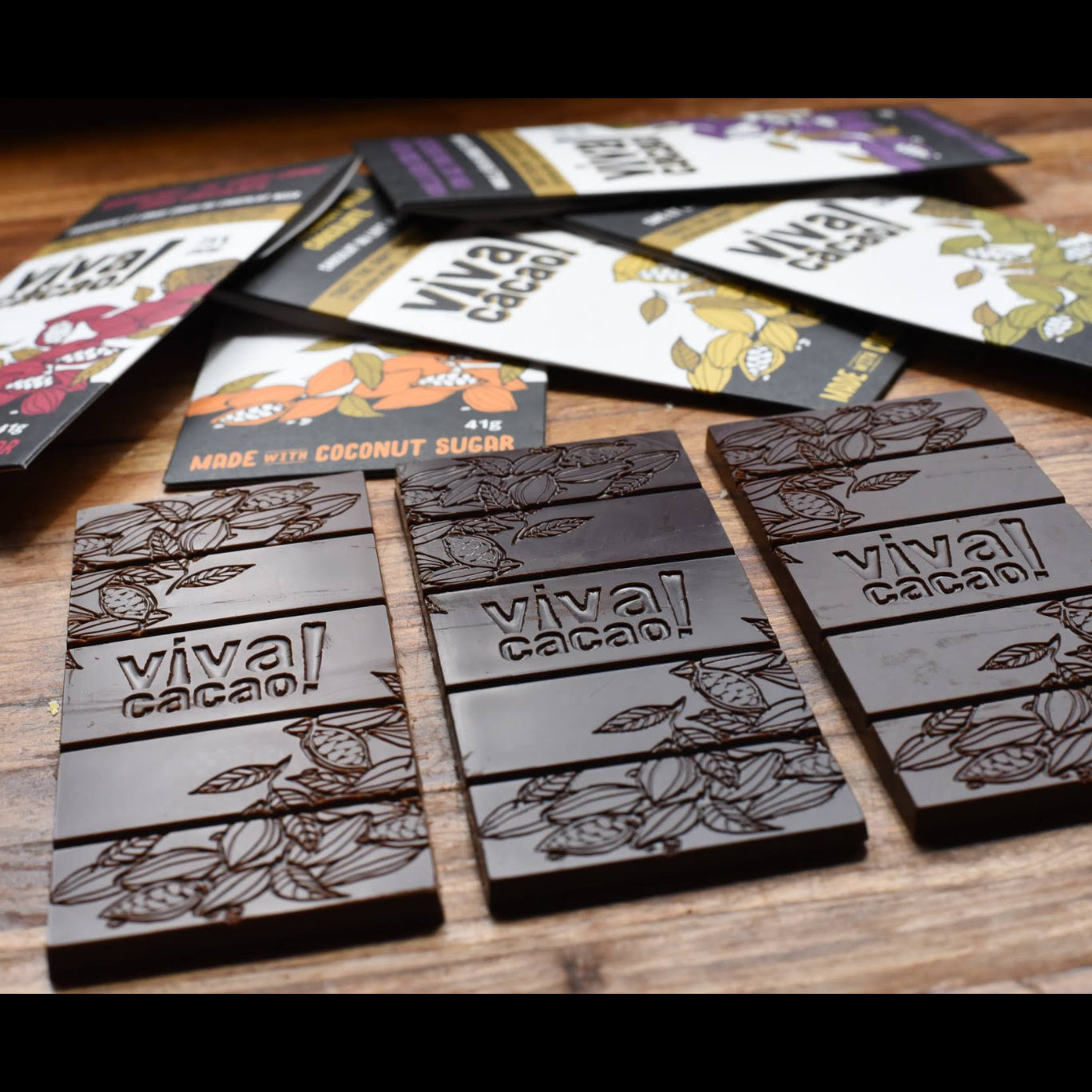 Viva! Cacao chocolate bars on a wooden surface